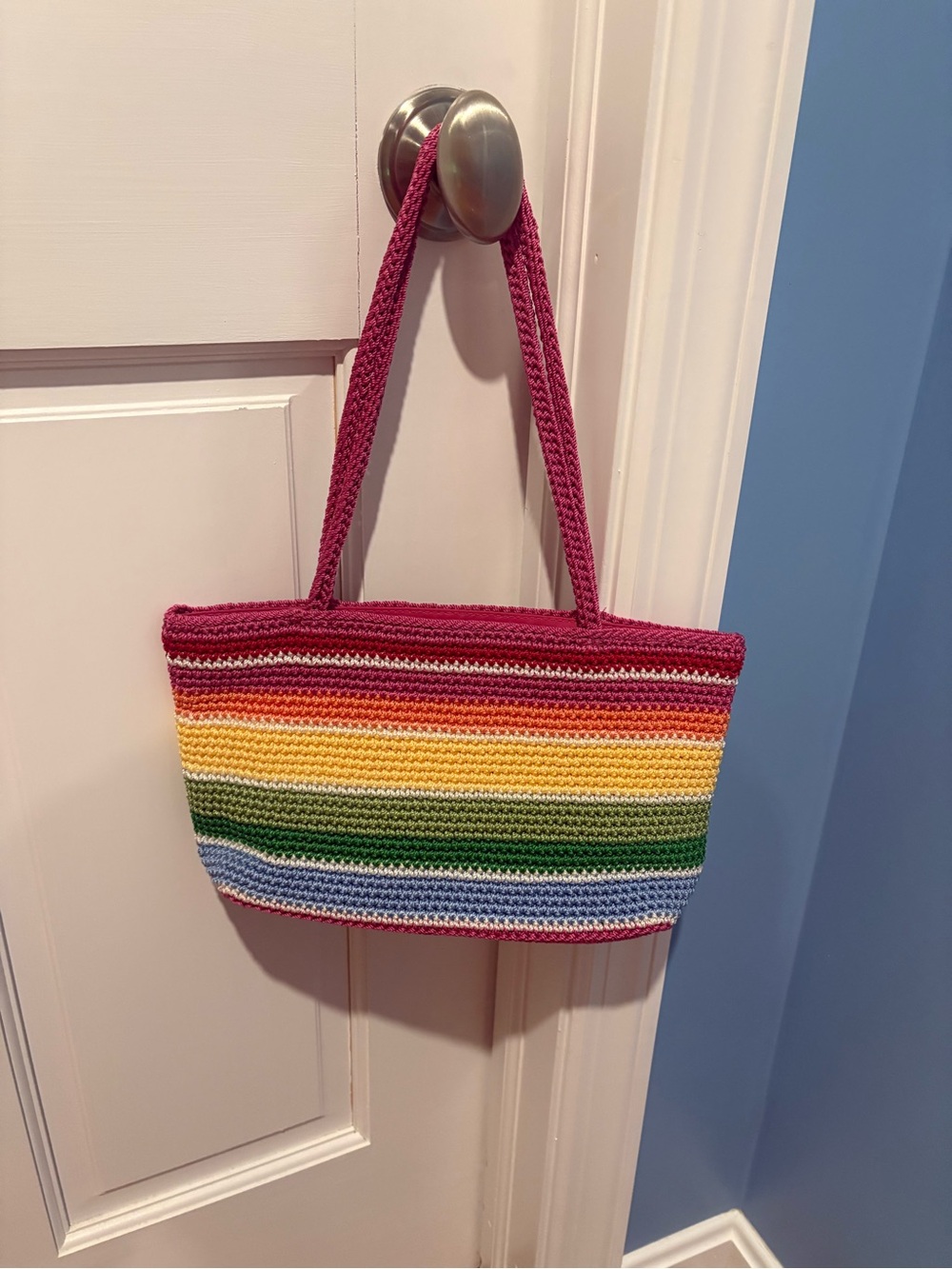 The Sak Striped Crochet Tote in Magenta and Rainbow Stripes